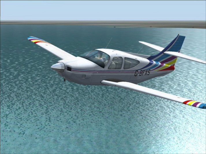 Flight 1 Commander 112A Rainbow Tail.jpg
