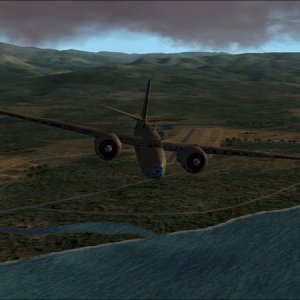 Flying NE over Lunga Point with (L to R) Fighter I, Henderson Field and Kokum Field (Fighter II) in distance.