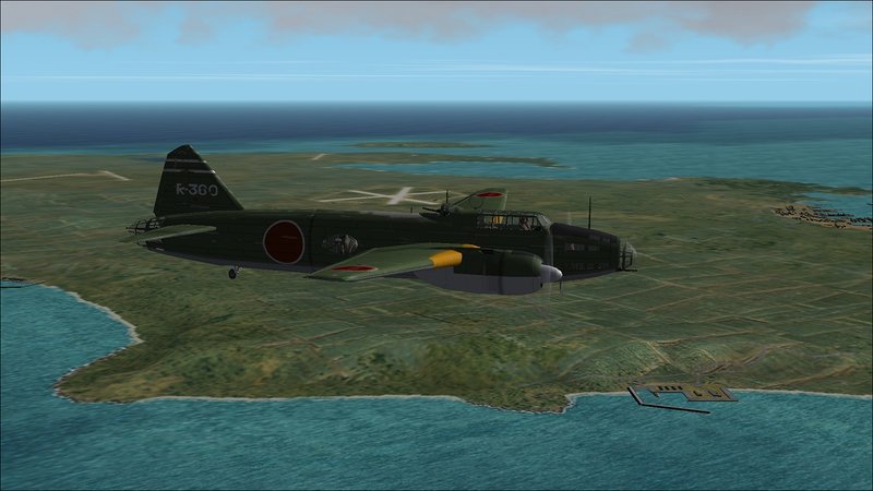 Again, flying NW along east coast of Miyako-Jima with Fukuyama Port in foreground and airfields and harbor in distance.