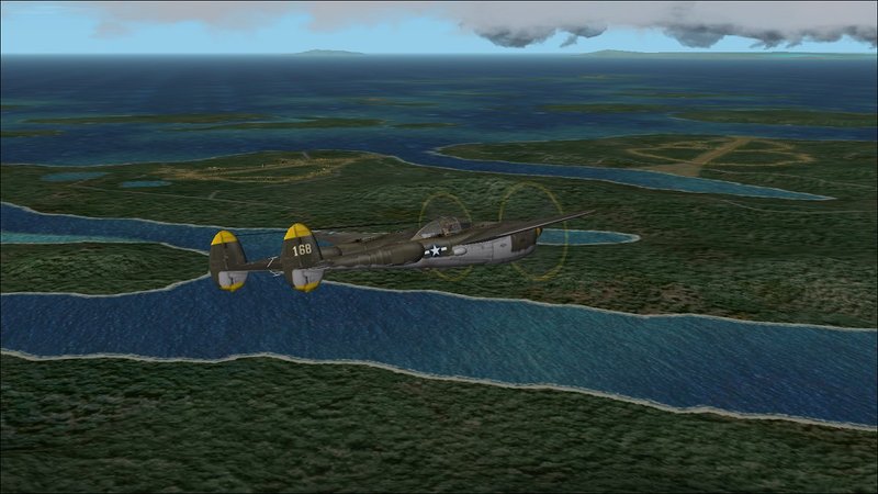 Russell Islands: flying south over Sunlight Channel with Sunlight Field (L) and Renard Field (R) in distance.